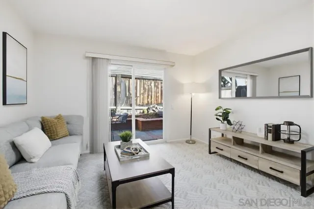 a living room with furniture and a couch