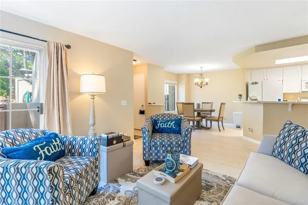 a living room with furniture and a table