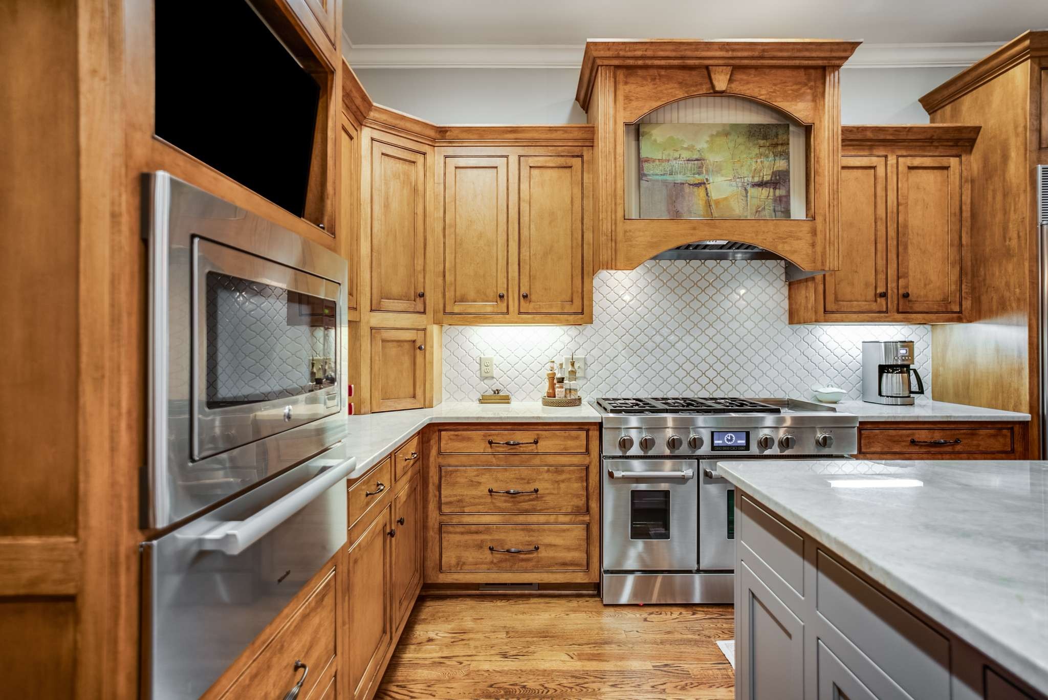 1539 Palmer Road Lebanon, TN 37090 - Photo 27 of 70 a kitchen with stainless steel appliances granite countertop a stove and a microwave
