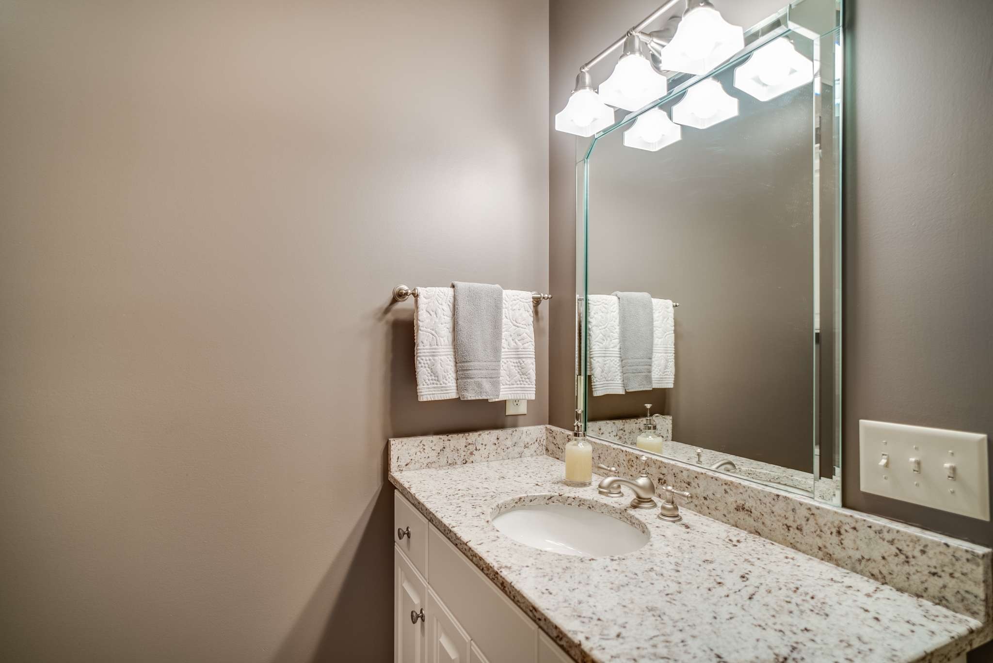 1539 Palmer Road Lebanon, TN 37090 - Photo 34 of 70 a bathroom with a granite countertop sink and a mirror