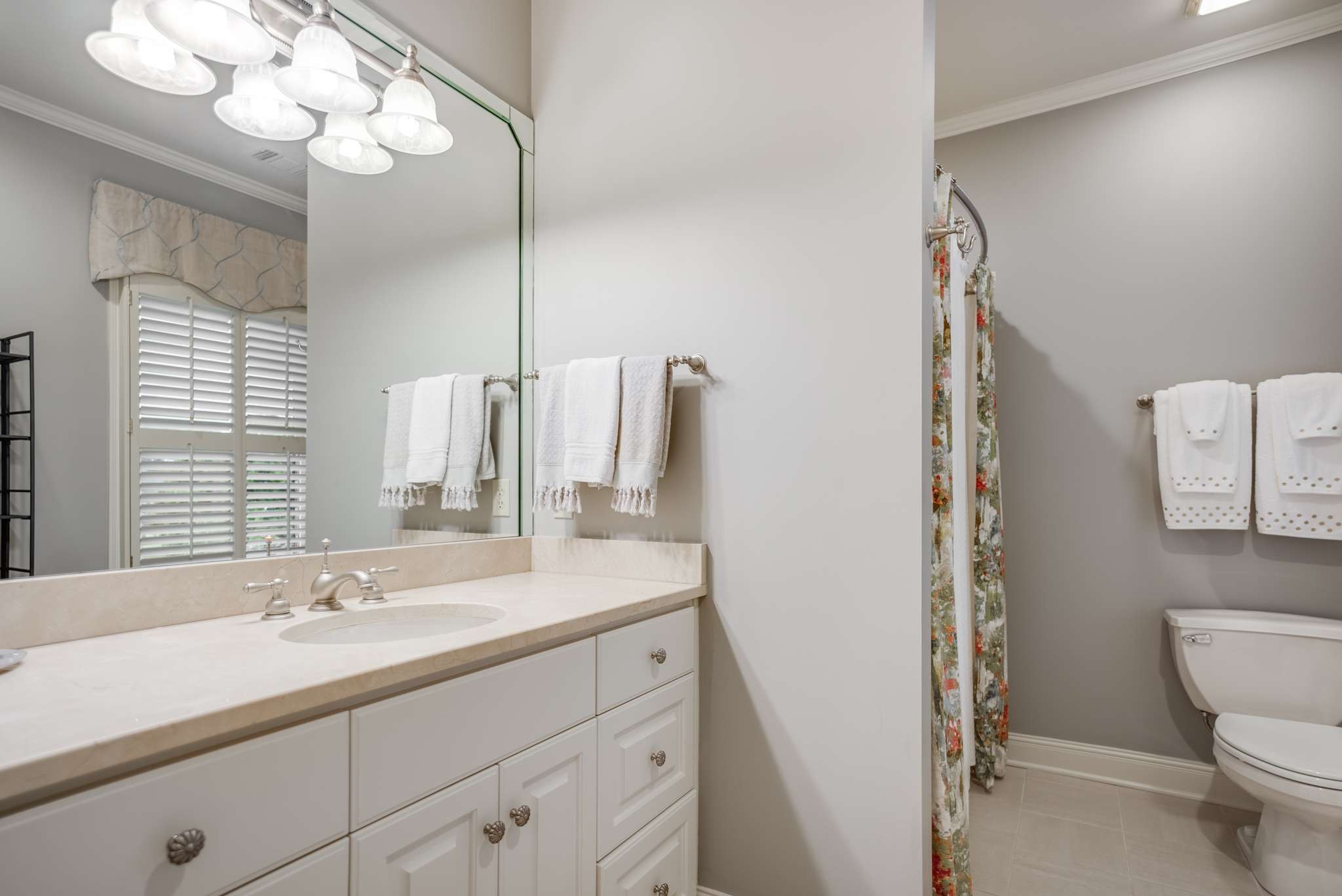 1539 Palmer Road Lebanon, TN 37090 - Photo 37 of 70 a bathroom with a granite countertop sink a toilet and a mirror