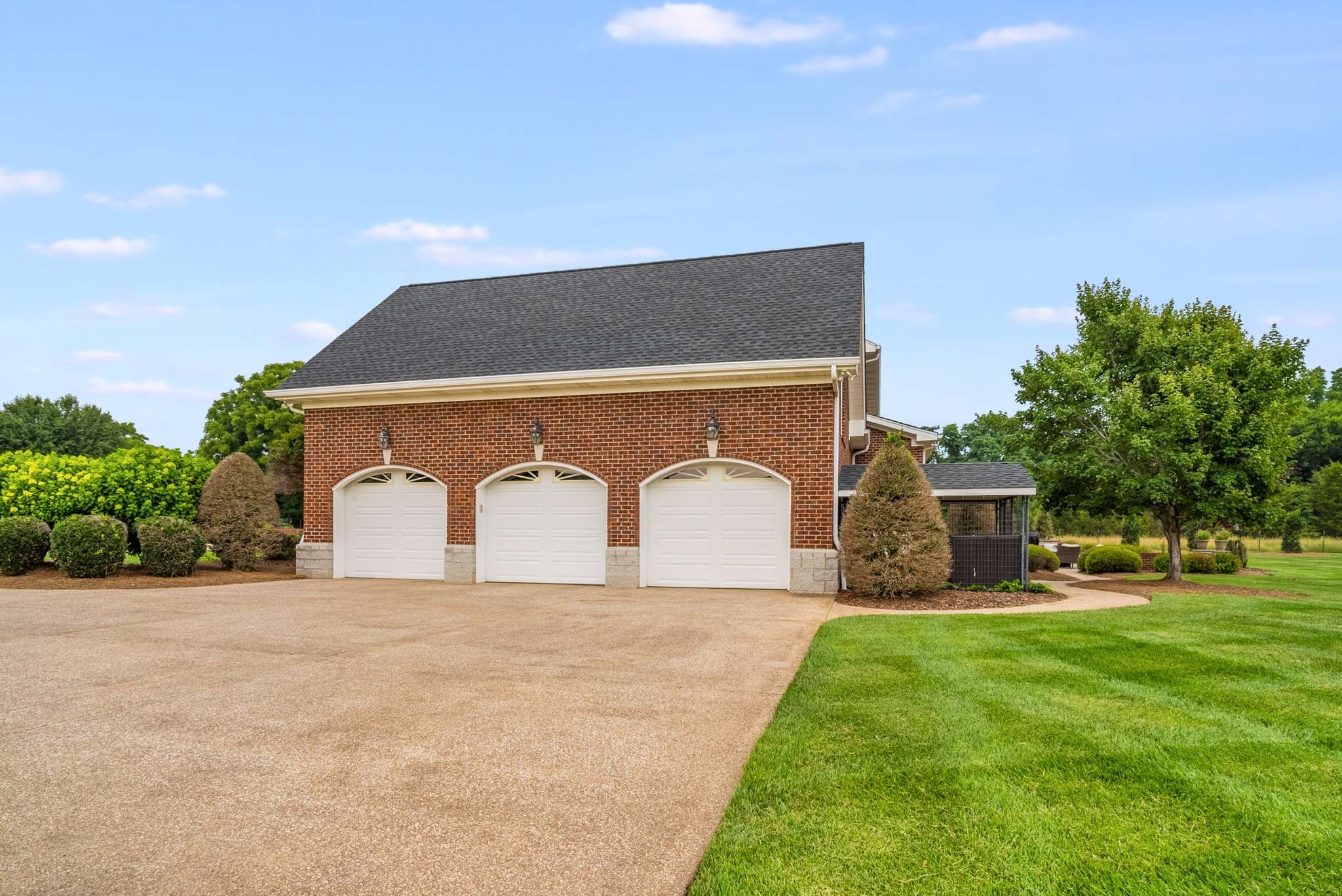 1539 Palmer Road Lebanon, TN 37090 - Photo 65 of 70 a front view of a house with a yard and garage