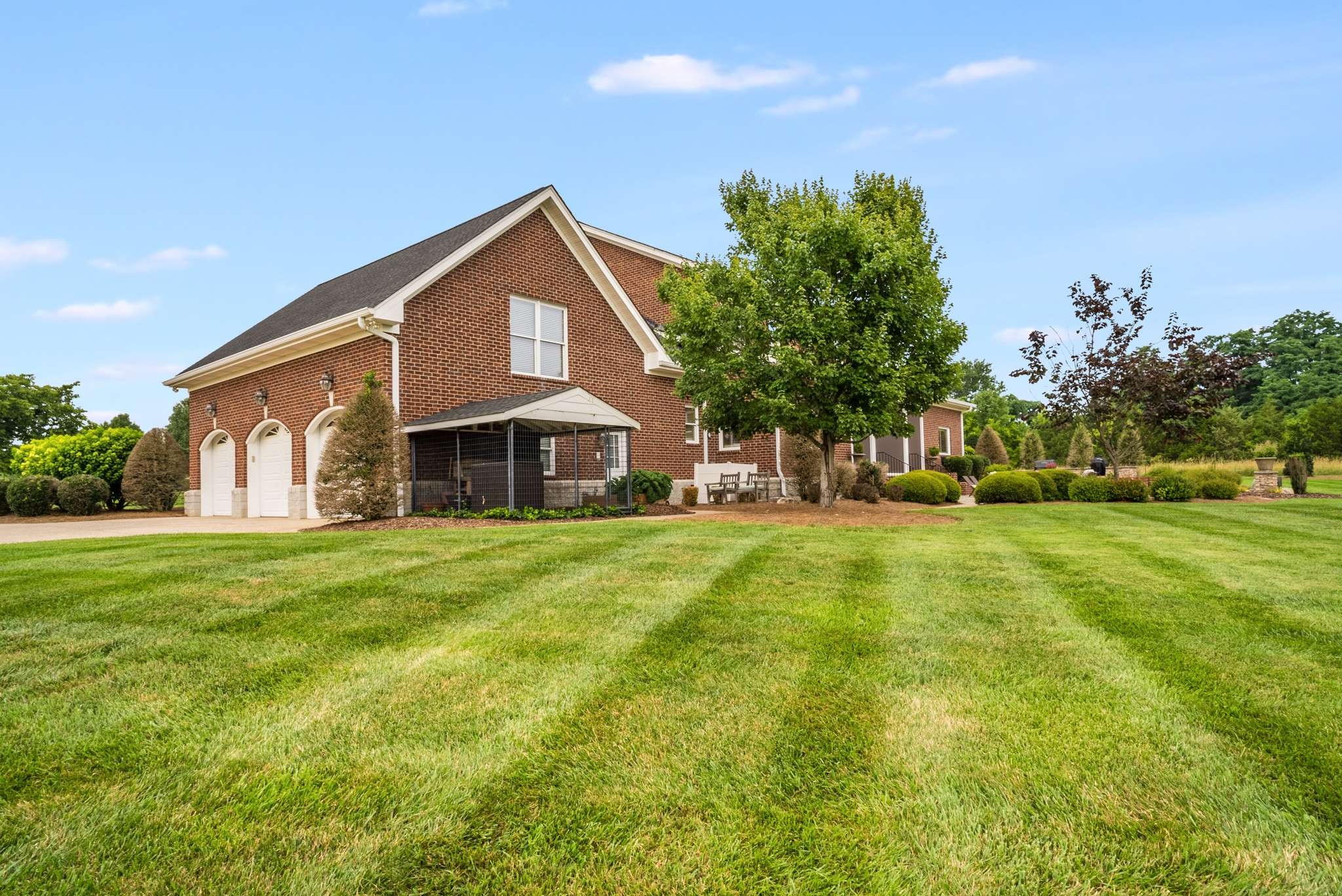 1539 Palmer Road Lebanon, TN 37090 - Photo 66 of 70 a front view of a house with a yard and trees