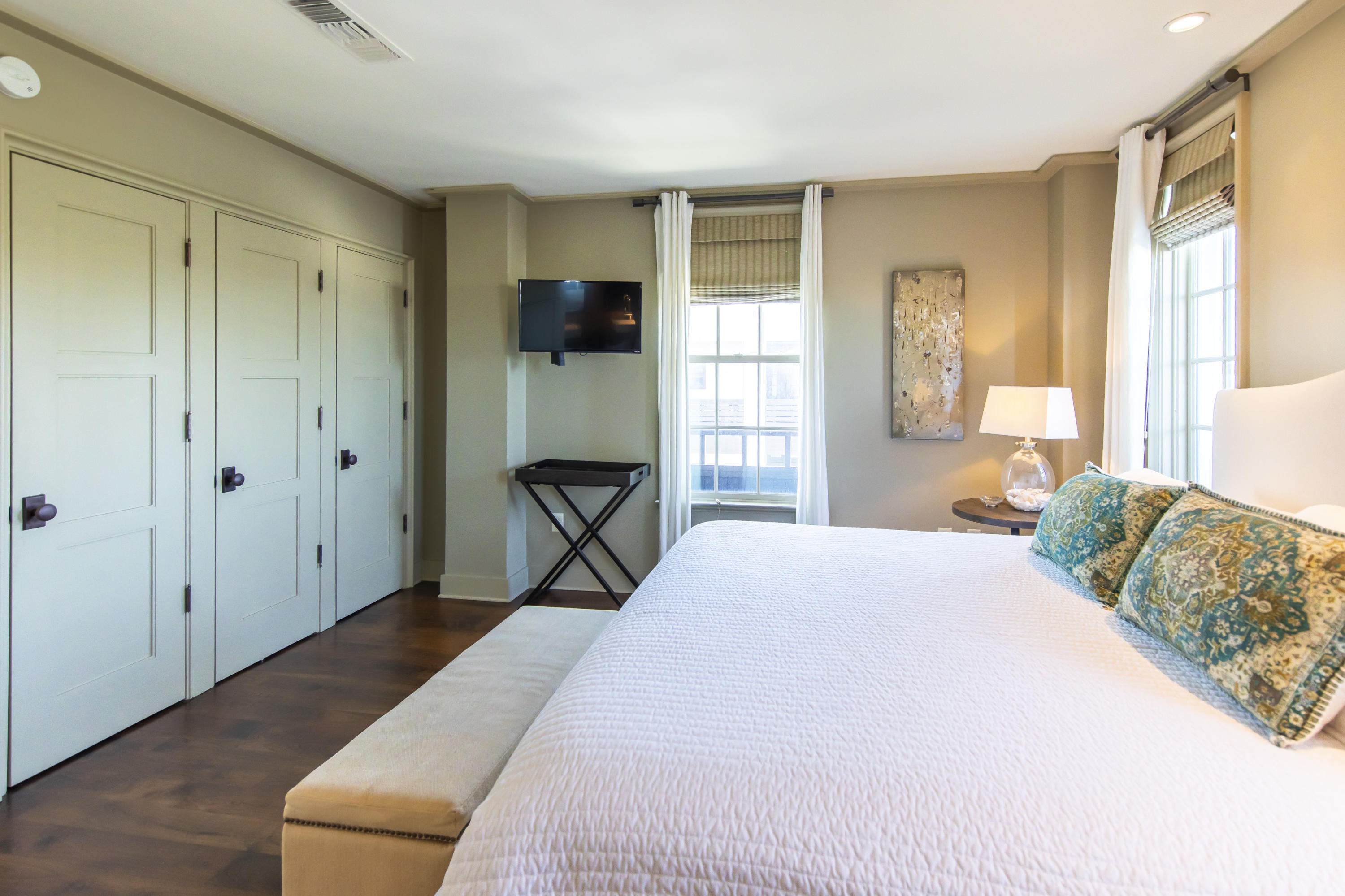 78 North Barrett Square, Unit 5 Inlet Beach, FL 32461 - Photo 8 of 25 a living room with a bed furniture and a window