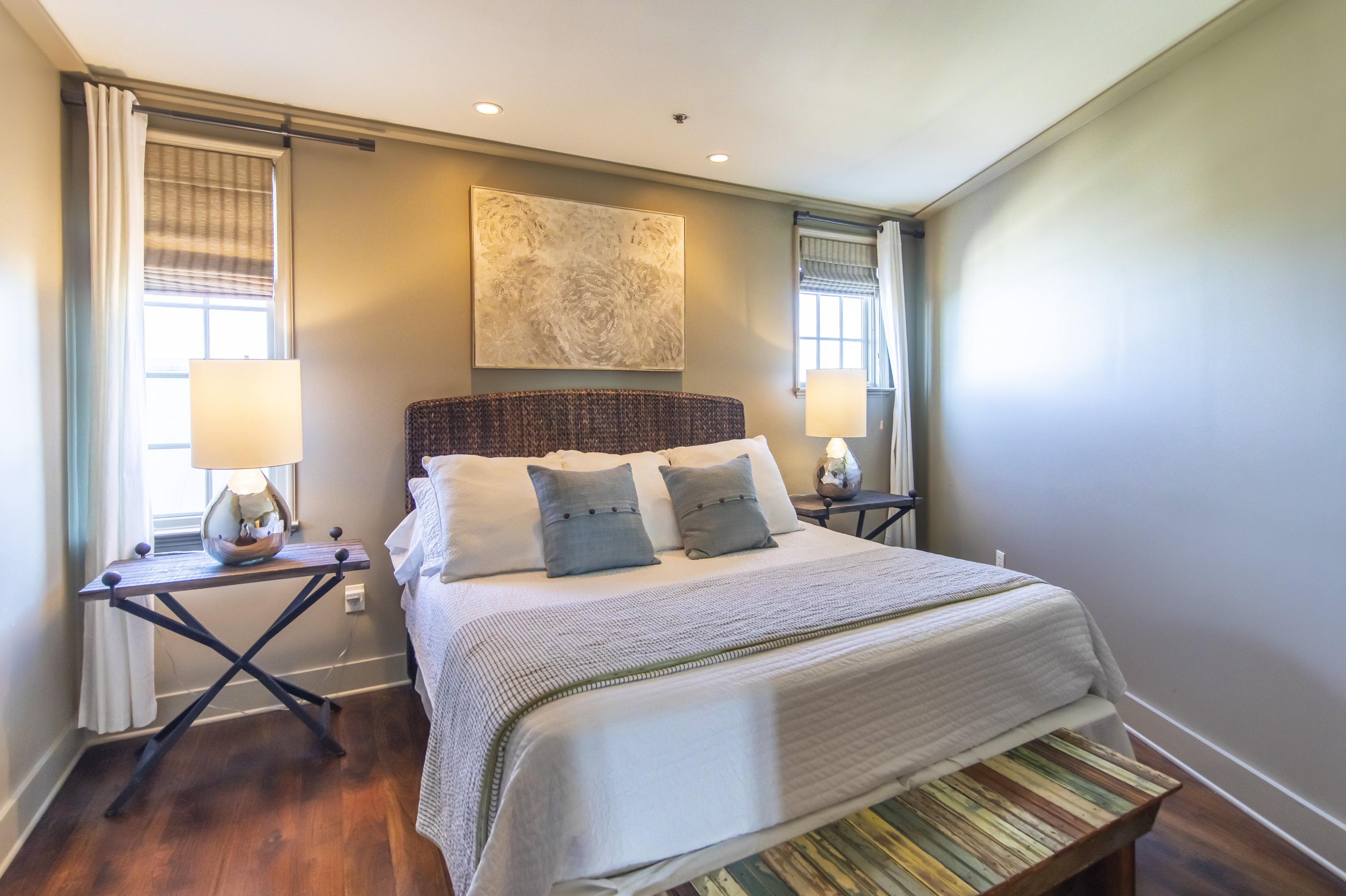 78 North Barrett Square, Unit 5 Inlet Beach, FL 32461 - Photo 10 of 25 a bedroom with a bed and wooden floor