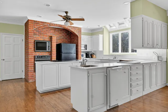 an aerial view of a house with mountain view