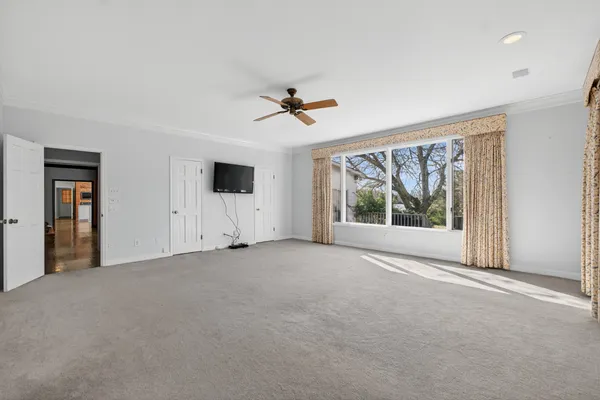 a kitchen with stainless steel appliances a refrigerator and a stove top oven