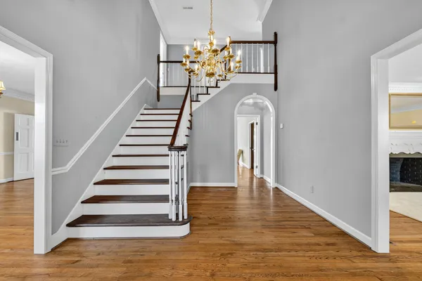 a view of entryway with wooden floor