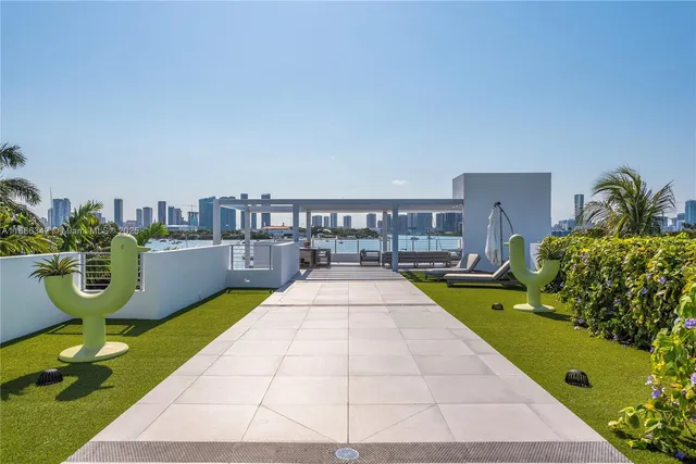 a bathroom with a bathtub and a sink