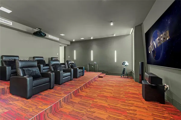 a spacious bedroom with a bed and a table