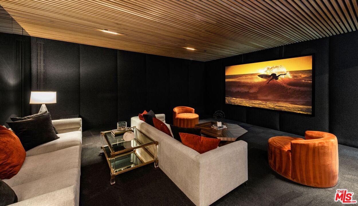 24350 Bridle Trail Road Hidden Hills, CA 91302 - Photo 11 of 23 a projector room with furniture