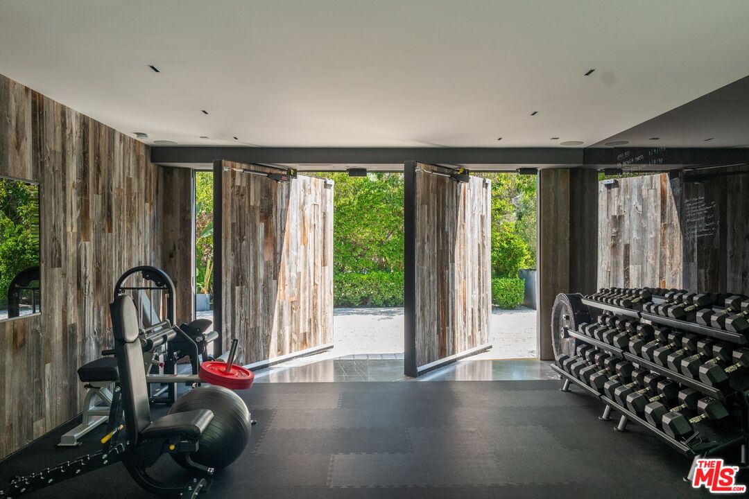 24350 Bridle Trail Road Hidden Hills, CA 91302 - Photo 13 of 23 a view of a room with gym equipment