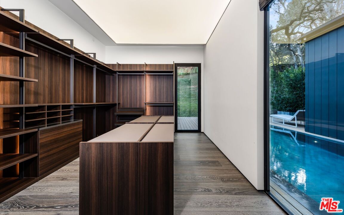 24350 Bridle Trail Road Hidden Hills, CA 91302 - Photo 17 of 23 a view of a walk in closet