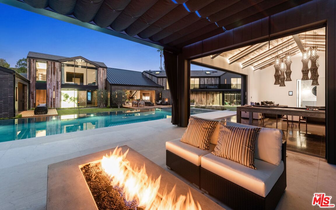 24350 Bridle Trail Road Hidden Hills, CA 91302 - Photo 19 of 23 a view of swimming pool with outdoor seating