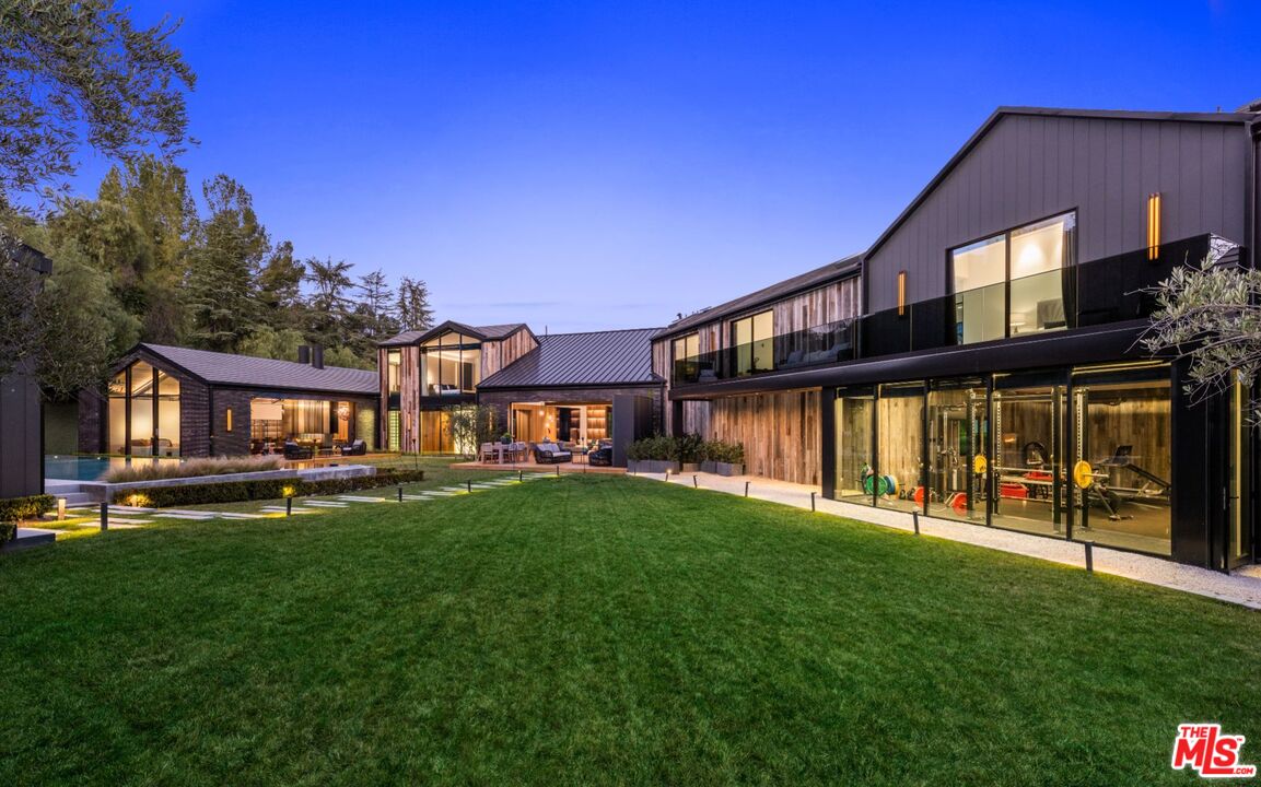 24350 Bridle Trail Road Hidden Hills, CA 91302 - Photo 22 of 23 a view of a house with a yard