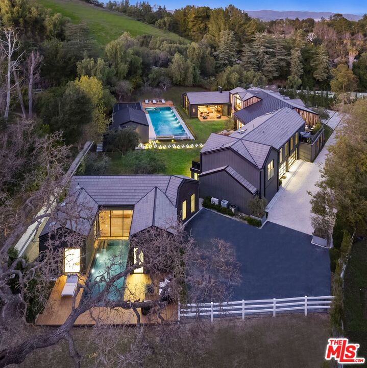 24350 Bridle Trail Road Hidden Hills, CA 91302 - Photo 23 of 23 an aerial view of a house with a yard fire pit and outdoor seating