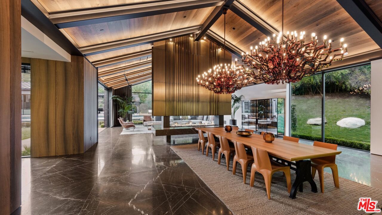 24350 Bridle Trail Road Hidden Hills, CA 91302 - Photo 4 of 23 a outdoor space with lots of table and chairs