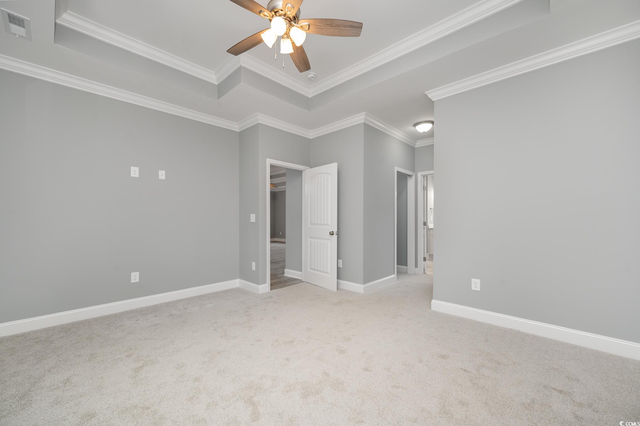 357 Log Cabin Road Loris, SC 29569 - Photo 16 of 27 Spare room featuring a raised ceiling, light color