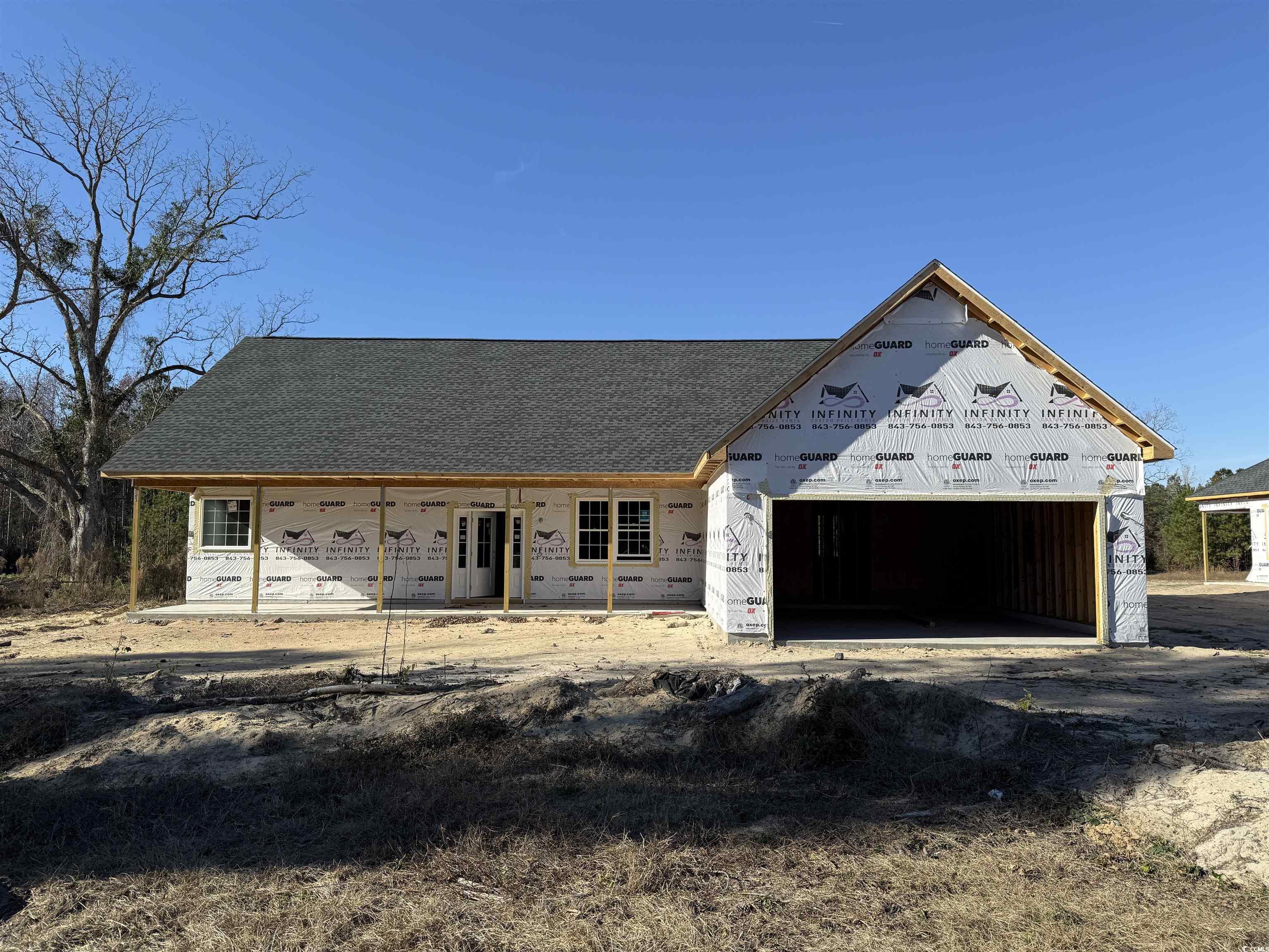 357 Log Cabin Road Loris, SC 29569 - Photo 22 of 27 Property under construction featuring covered porc
