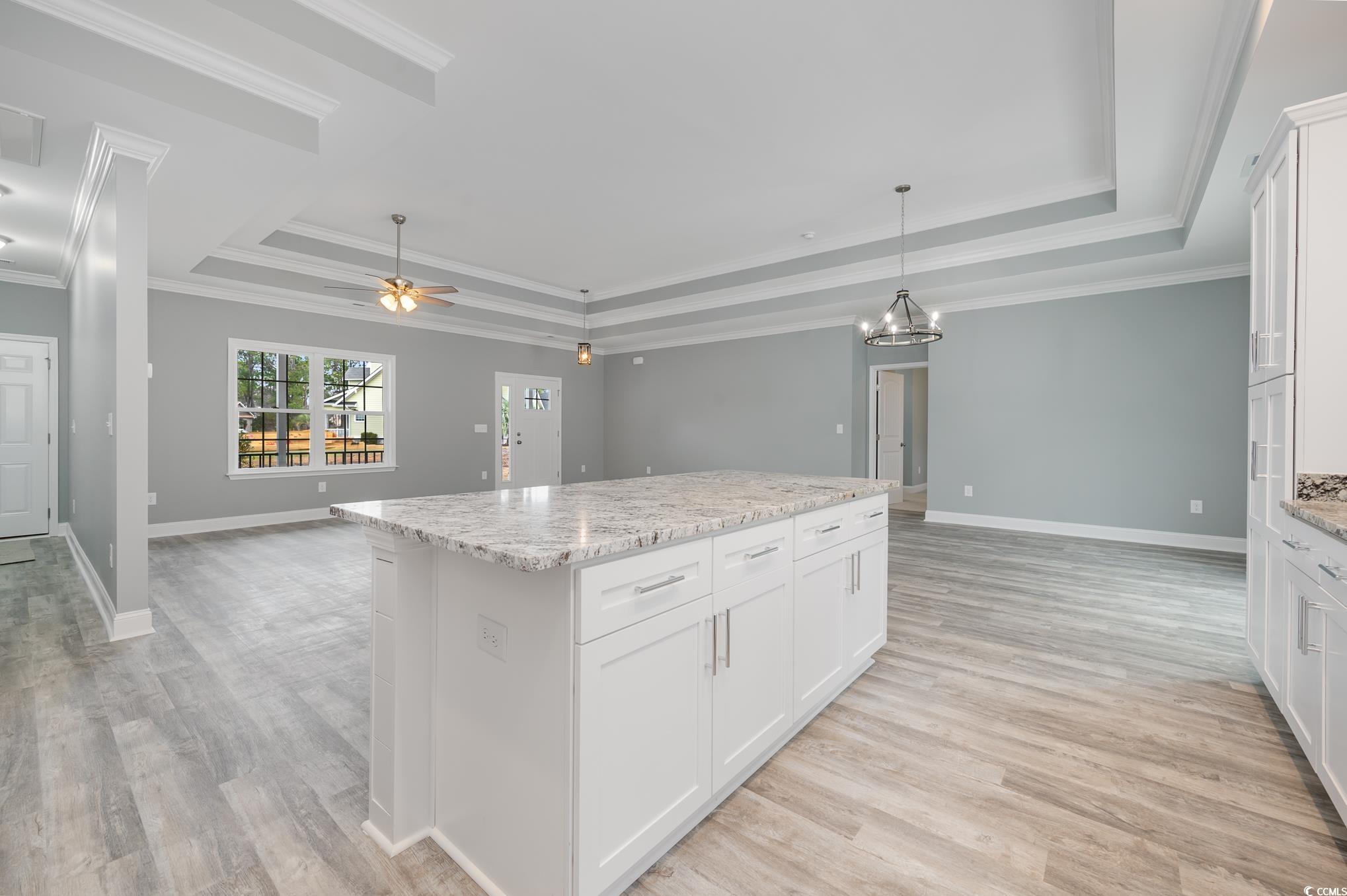 357 Log Cabin Road Loris, SC 29569 - Photo 8 of 27 Kitchen featuring ceiling fan with notable chandel
