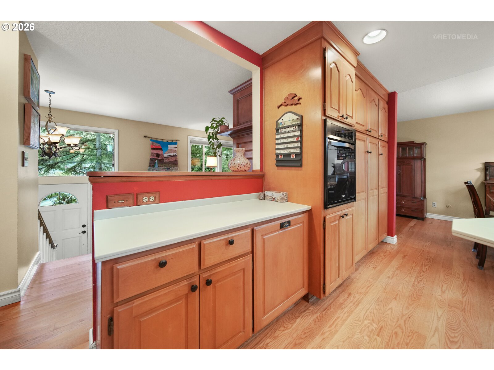17738 Kelok Road Lake Oswego, OR 97034 - Photo 11 of 48 a view of kitchen with furniture and wooden floor