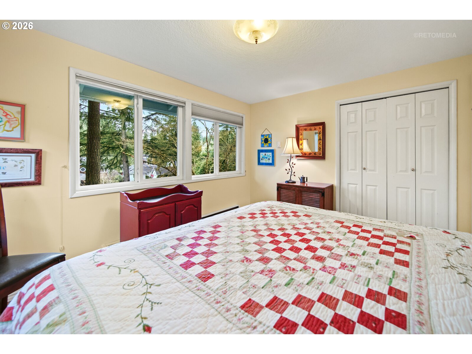 17738 Kelok Road Lake Oswego, OR 97034 - Photo 18 of 48 a bedroom with a bed and a dresser