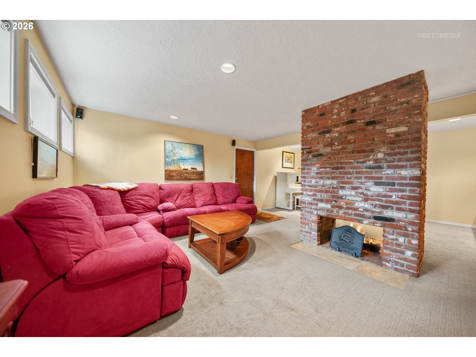 17738 Kelok Road Lake Oswego, OR 97034 - Photo 22 of 48 a living room with furniture and a fireplace