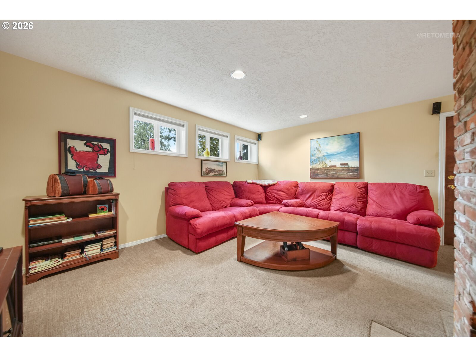 17738 Kelok Road Lake Oswego, OR 97034 - Photo 23 of 48 a living room with furniture and a flat screen tv