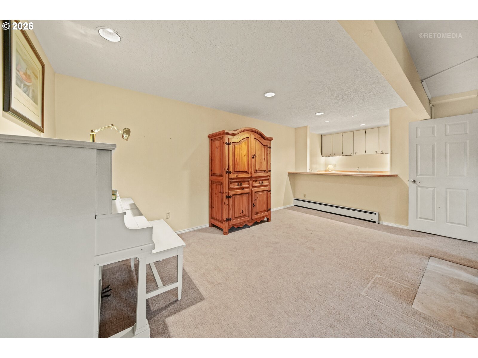 17738 Kelok Road Lake Oswego, OR 97034 - Photo 25 of 48 a room with furniture and wooden floor