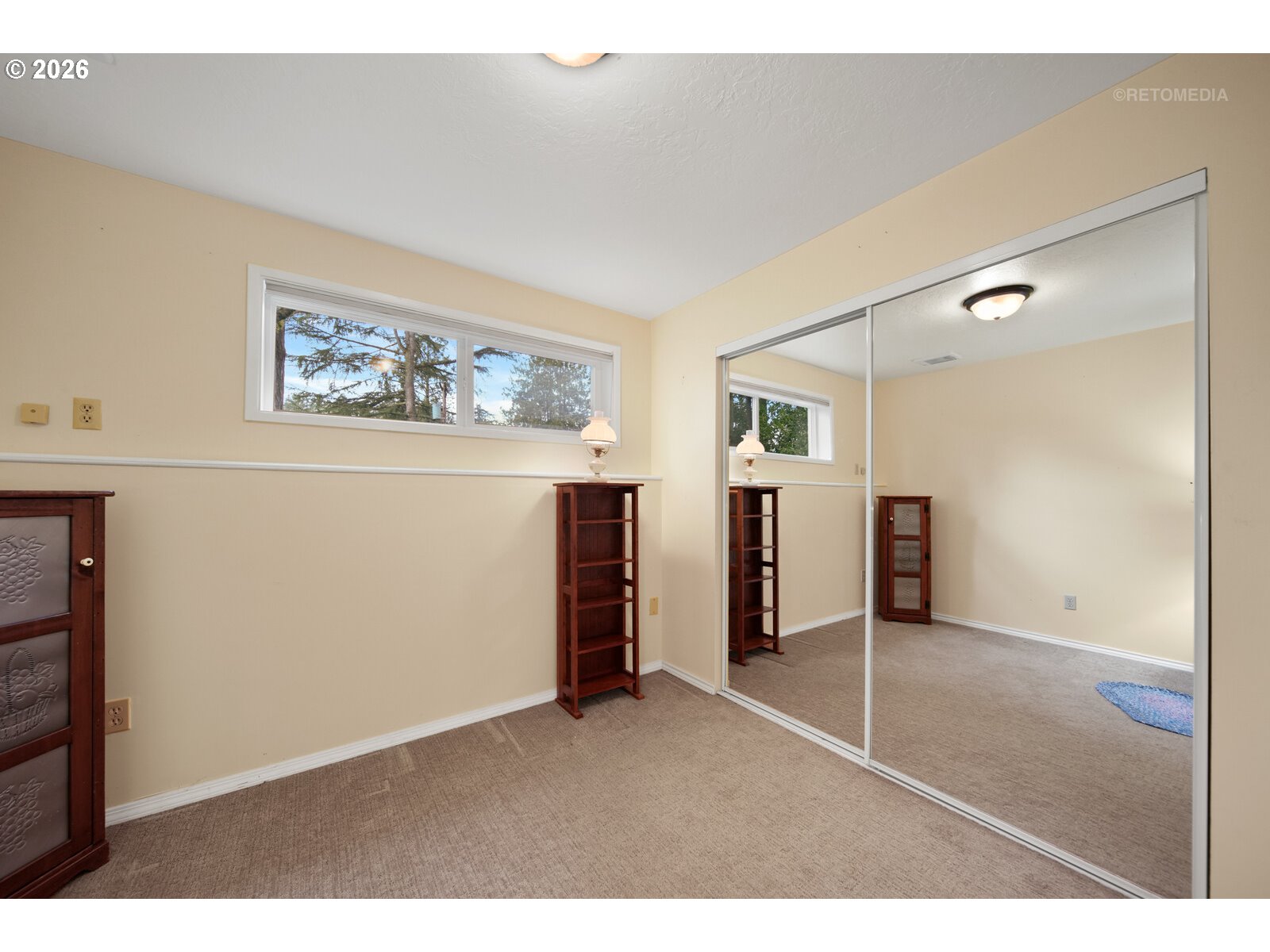 17738 Kelok Road Lake Oswego, OR 97034 - Photo 30 of 48 a room with furniture and closet