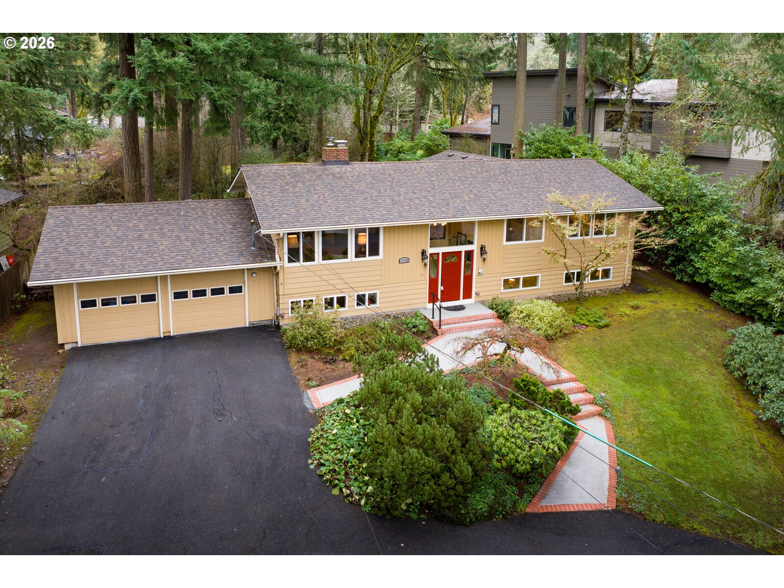 17738 Kelok Road Lake Oswego, OR 97034 - Photo 3 of 48 a aerial view of a house with garden