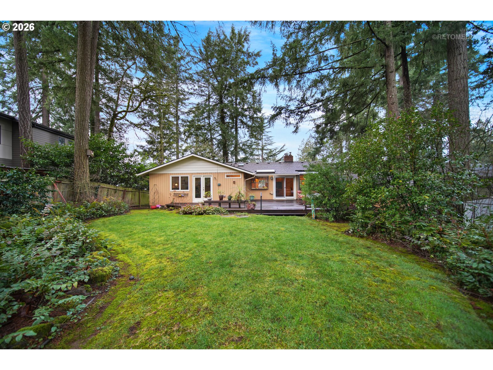 17738 Kelok Road Lake Oswego, OR 97034 - Photo 34 of 48 a view of a house with backyard and garden