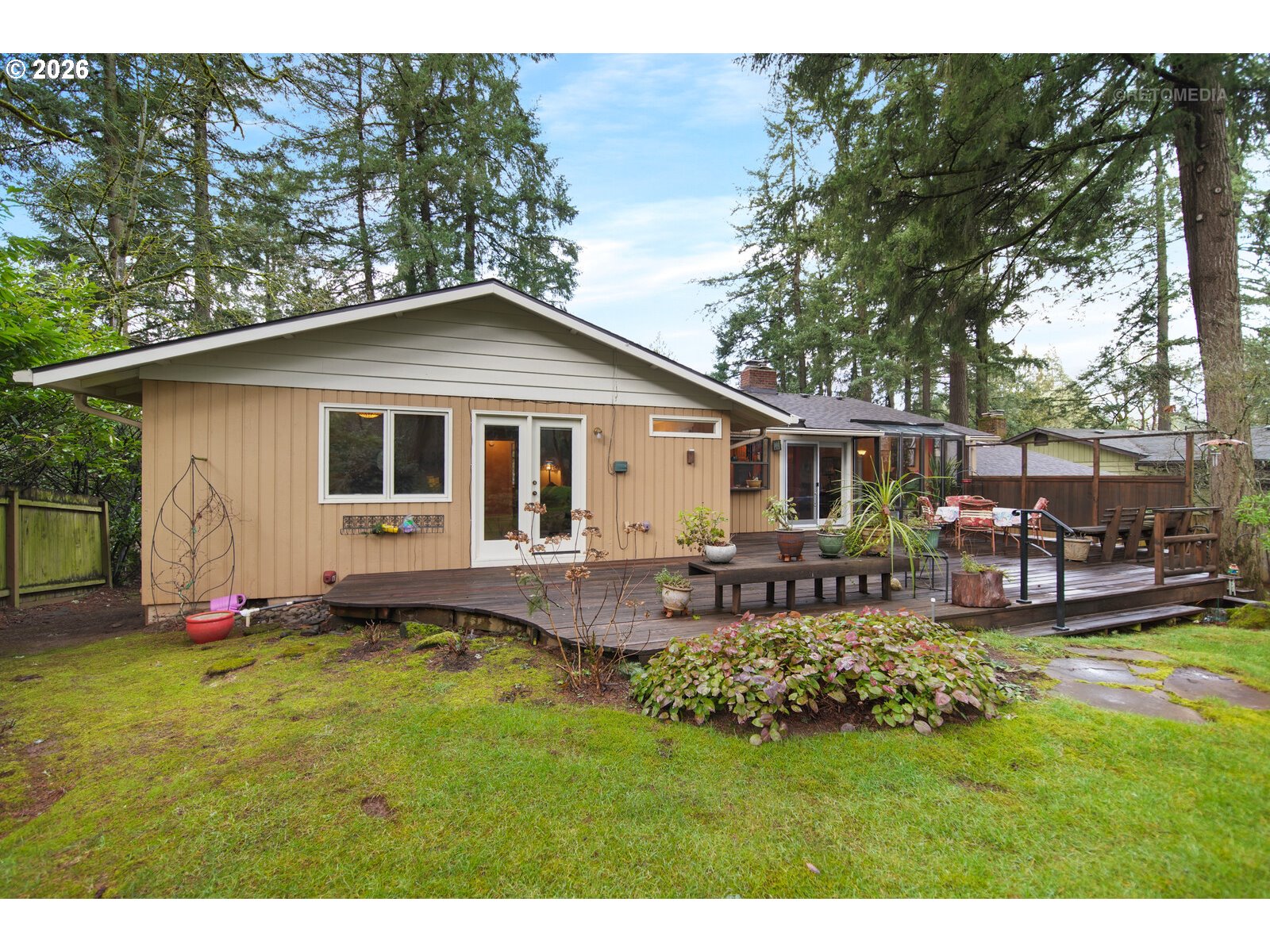 17738 Kelok Road Lake Oswego, OR 97034 - Photo 40 of 48 a front view of house with yard and seating area