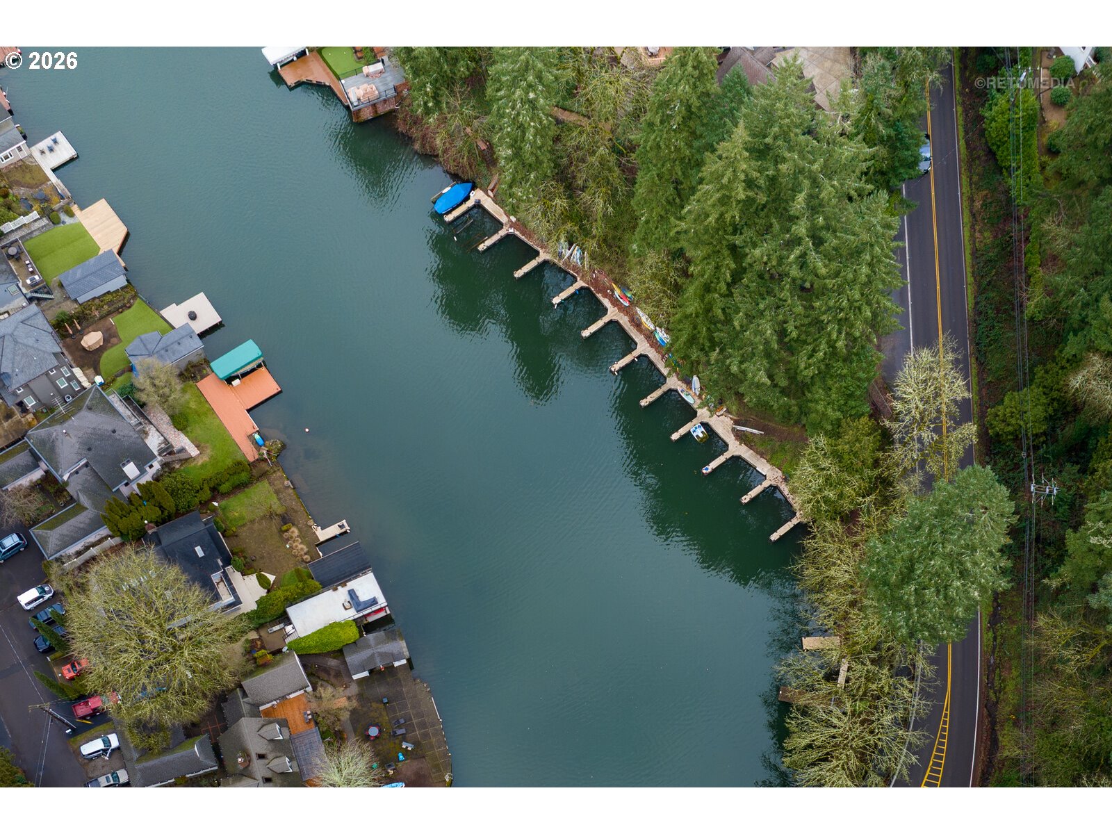 17738 Kelok Road Lake Oswego, OR 97034 - Photo 47 of 48 a view of a house with a garden