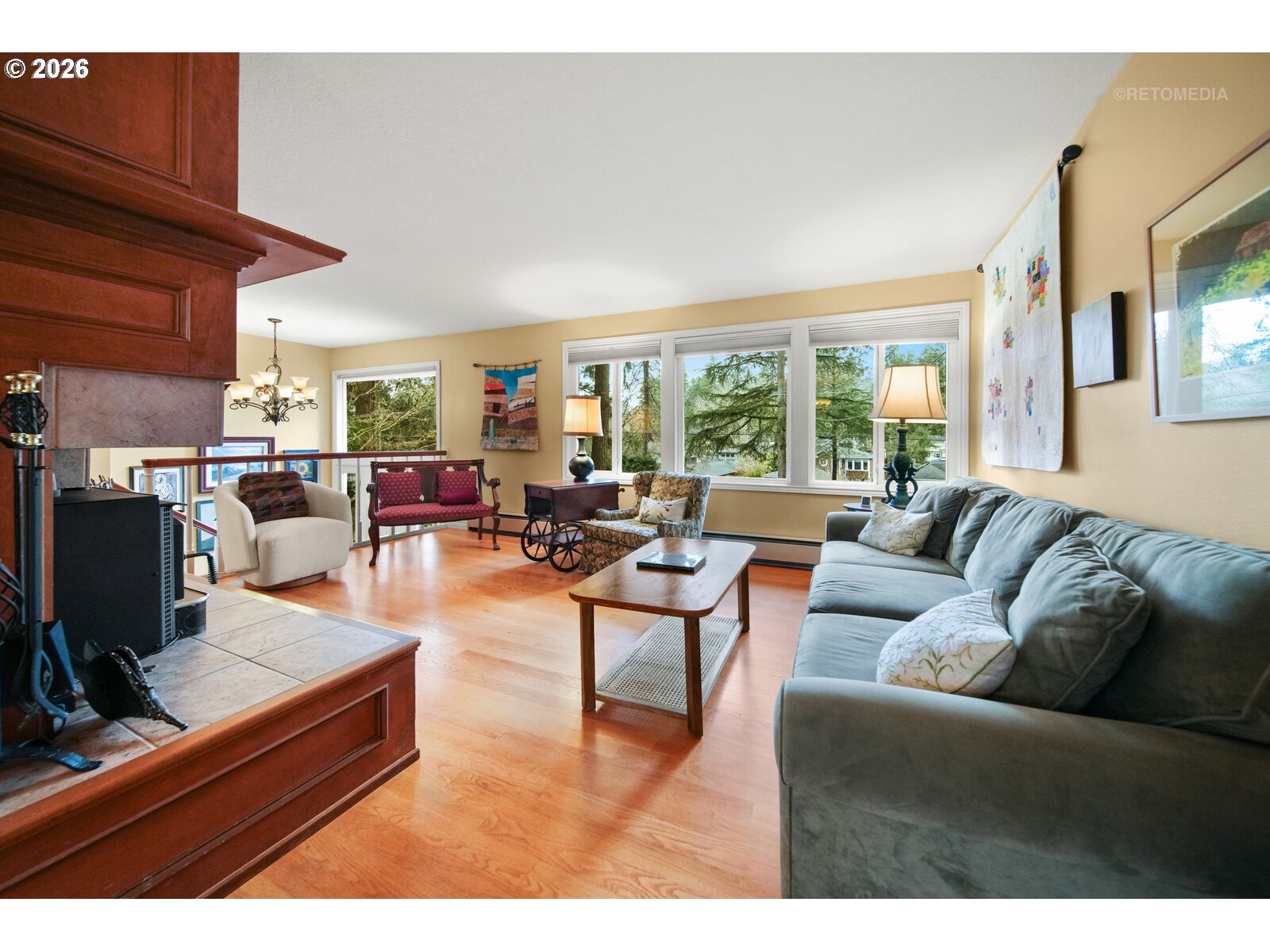 17738 Kelok Road Lake Oswego, OR 97034 - Photo 7 of 48 a living room with furniture kitchen view and a large window