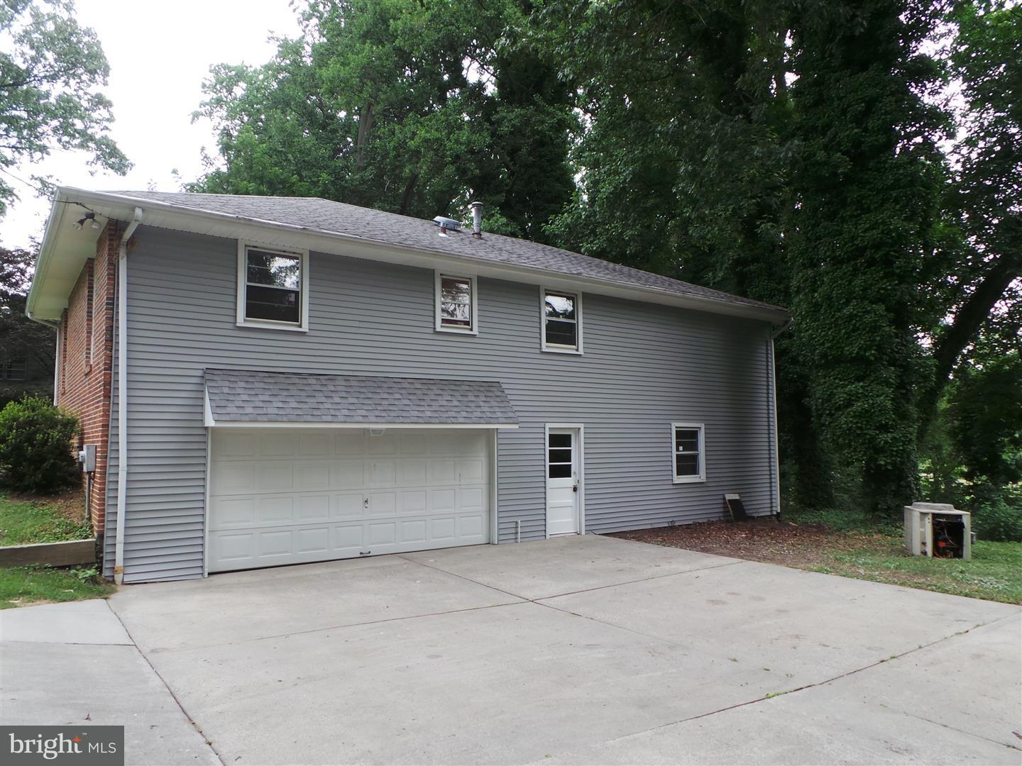 1711 Prospect Ridge Boulevard Haddon Heights, NJ 08035 - Photo 2 of 24 a front view of a house with a garage