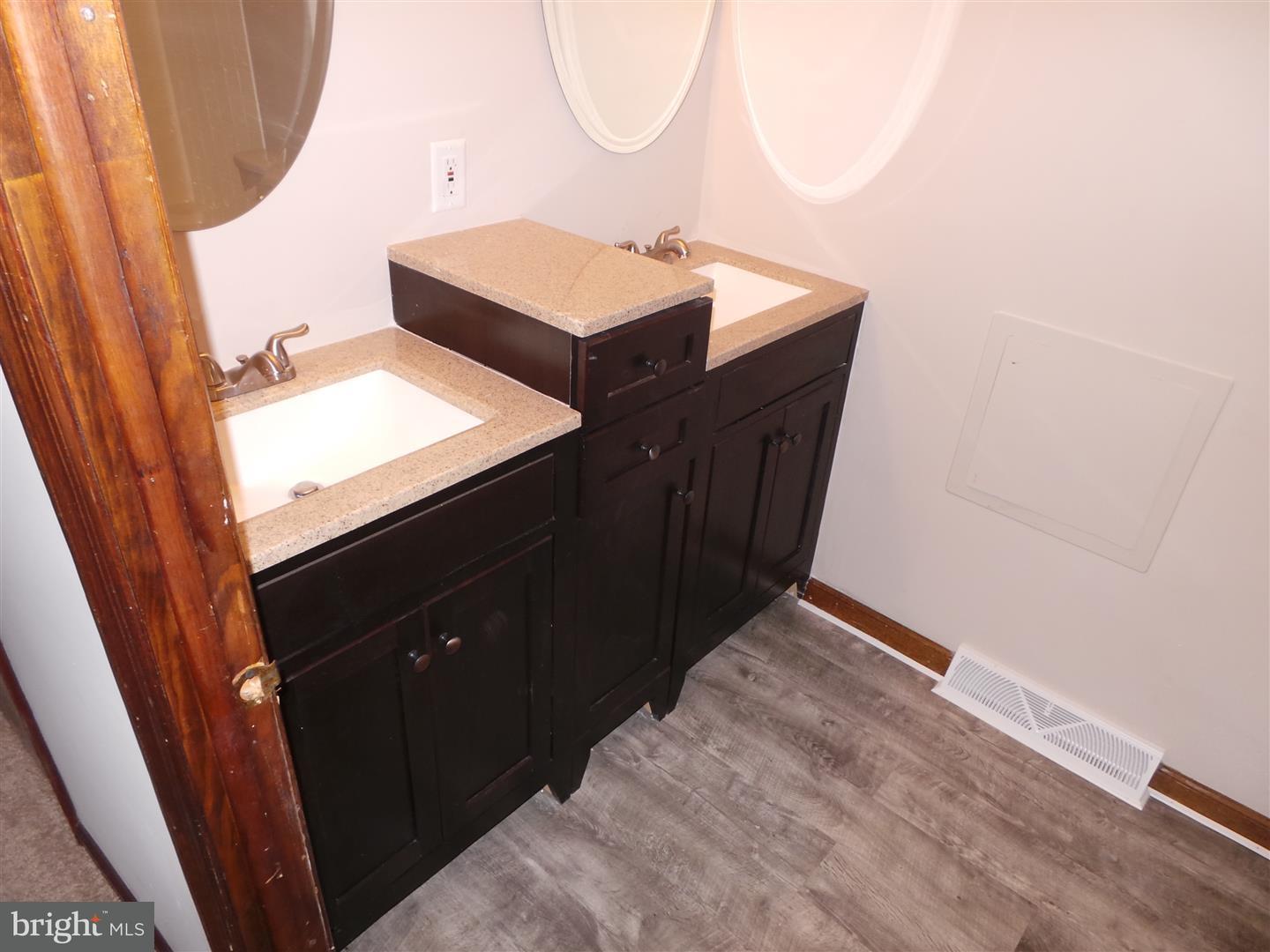 1711 Prospect Ridge Boulevard Haddon Heights, NJ 08035 - Photo 15 of 24 a bathroom with a sink and a mirror