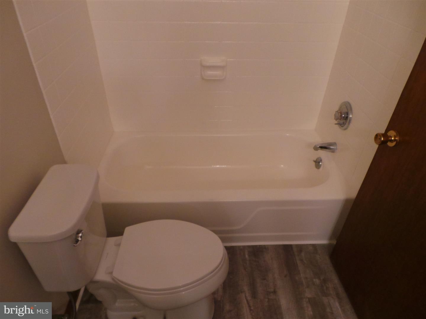 1711 Prospect Ridge Boulevard Haddon Heights, NJ 08035 - Photo 16 of 24 a bathroom with a toilet and a chair