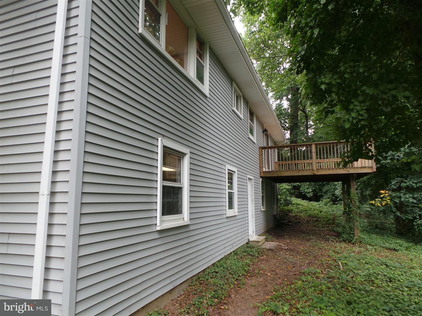 1711 Prospect Ridge Boulevard Haddon Heights, NJ 08035 - Photo 3 of 24 a view of a backyard with a large tree