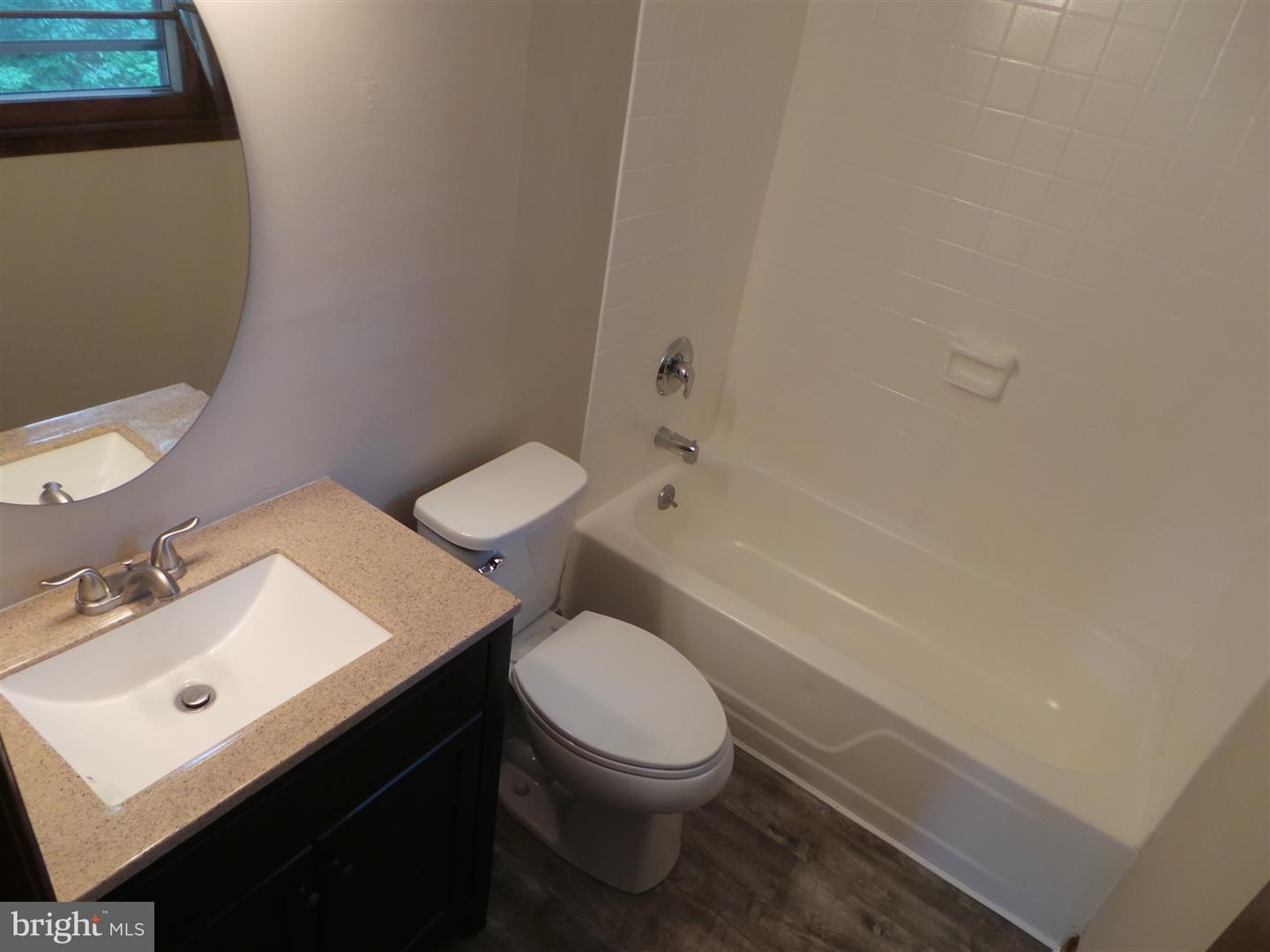 1711 Prospect Ridge Boulevard Haddon Heights, NJ 08035 - Photo 21 of 24 a white toilet sitting next to a bathroom sink