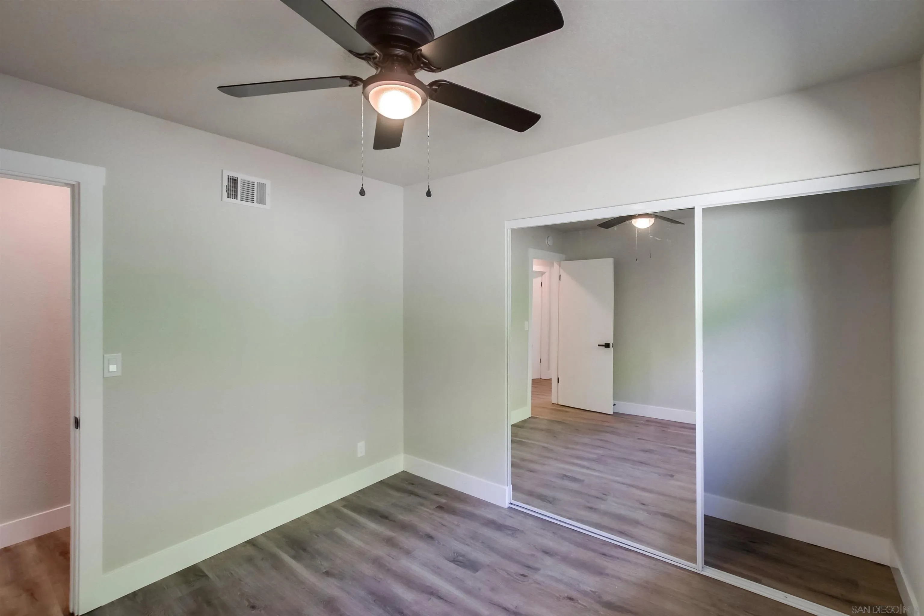 238 69th Street San Diego, CA 92114 - Photo 20 of 27 wooden floor in an empty room