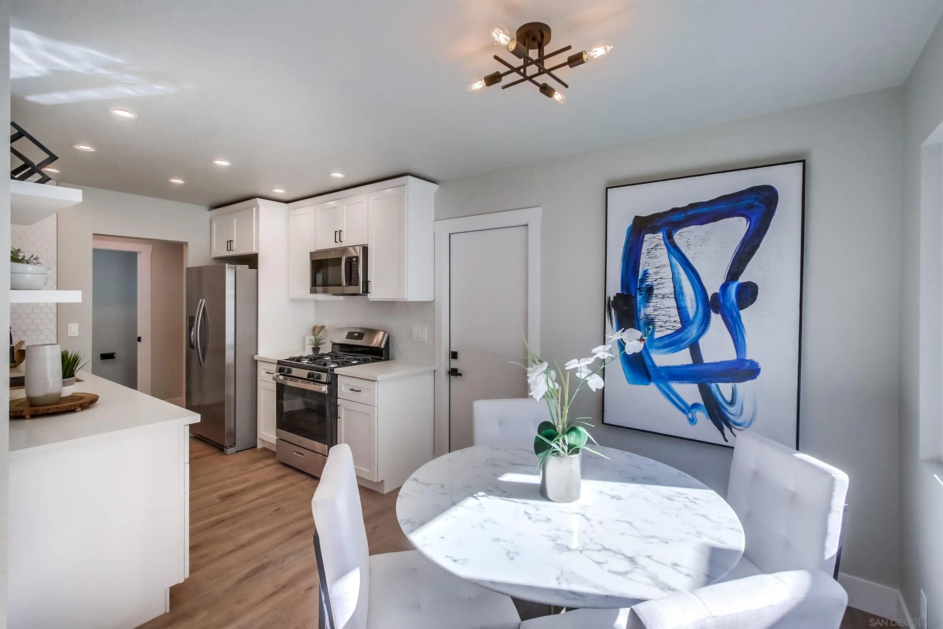 238 69th Street San Diego, CA 92114 - Photo 2 of 27 a dining room with furniture and window