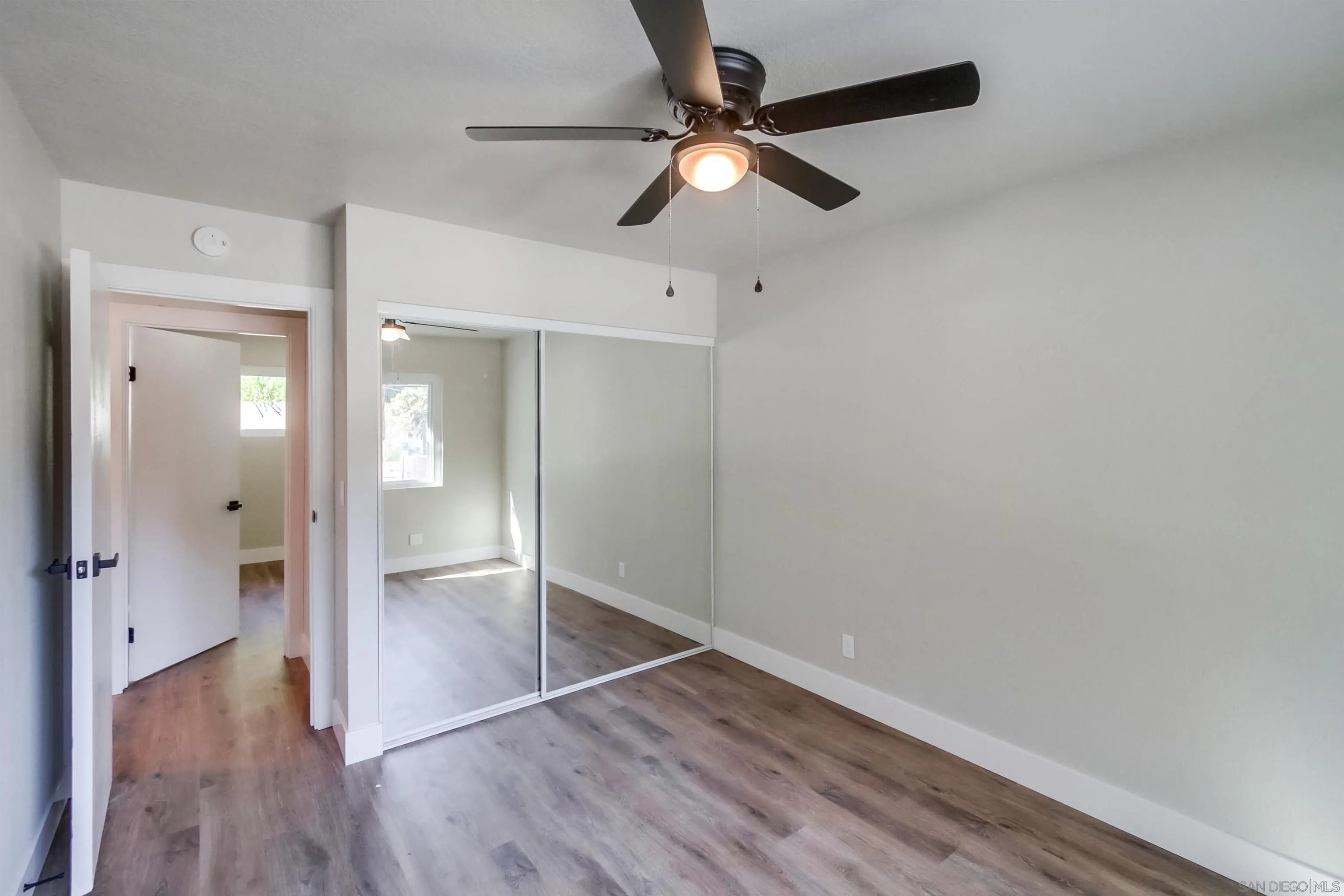 238 69th Street San Diego, CA 92114 - Photo 22 of 27 wooden floor in an empty room