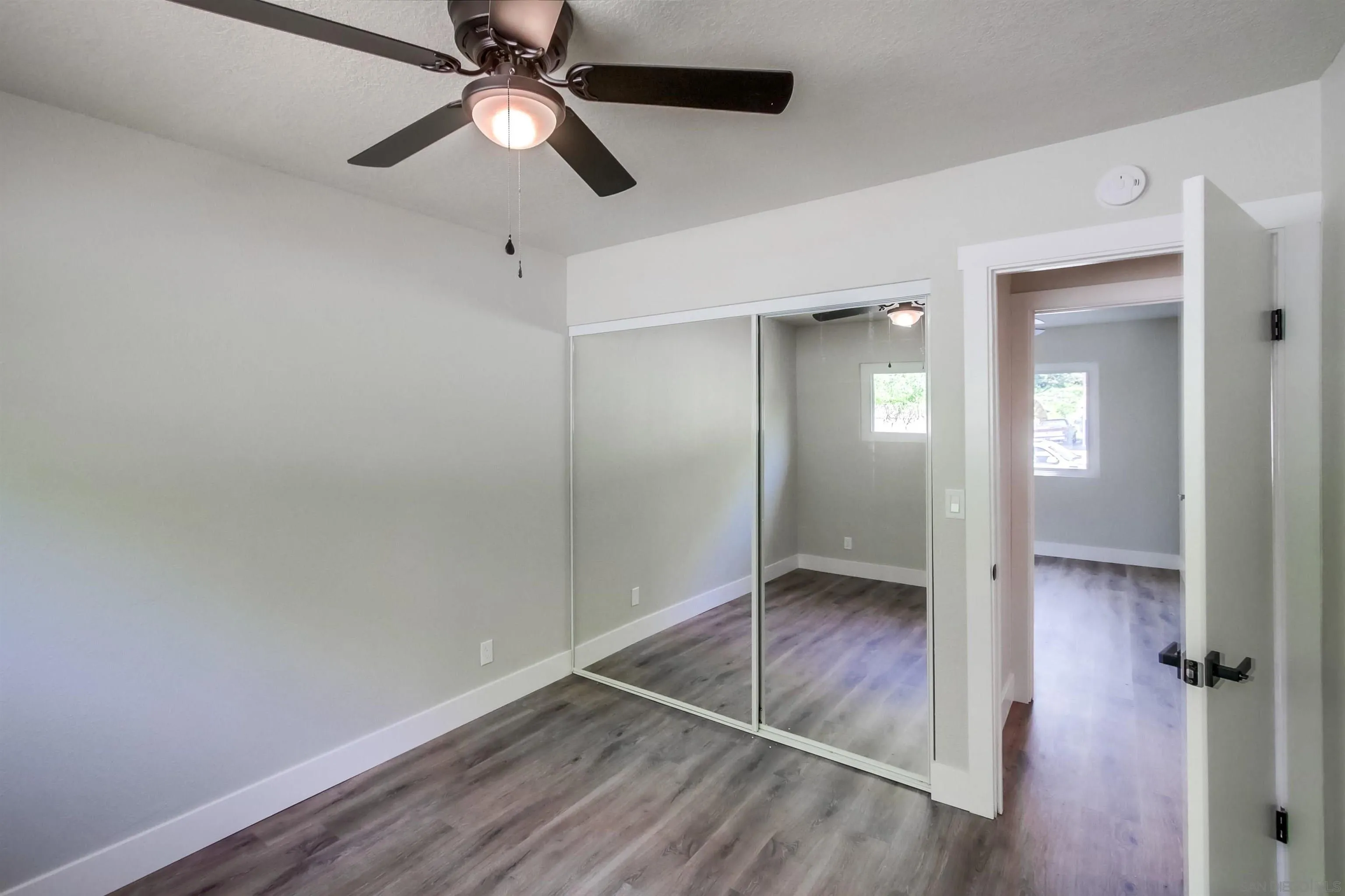 238 69th Street San Diego, CA 92114 - Photo 24 of 27 wooden floor in an empty room