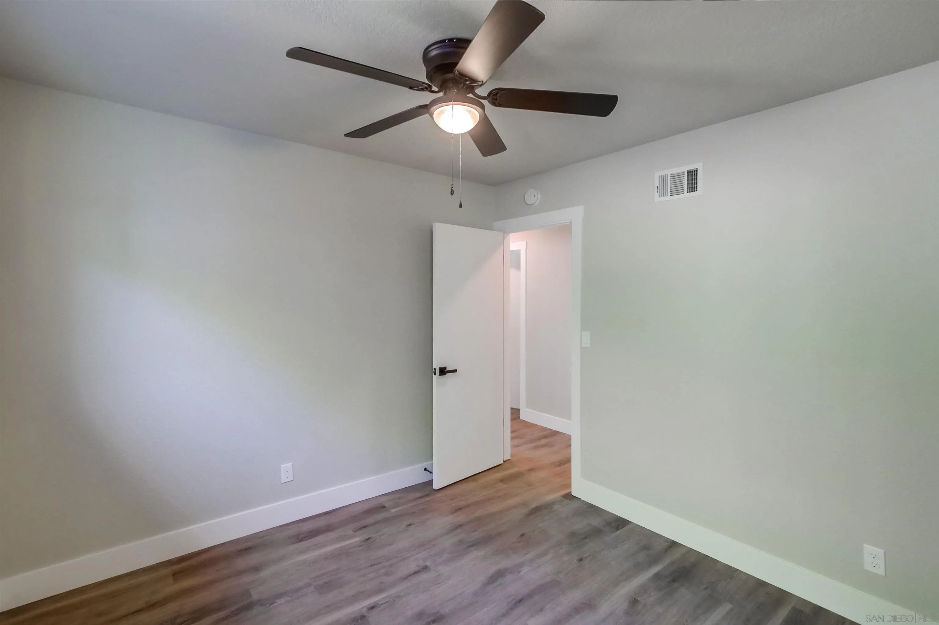 238 69th Street San Diego, CA 92114 - Photo 25 of 27 wooden floor in an empty room