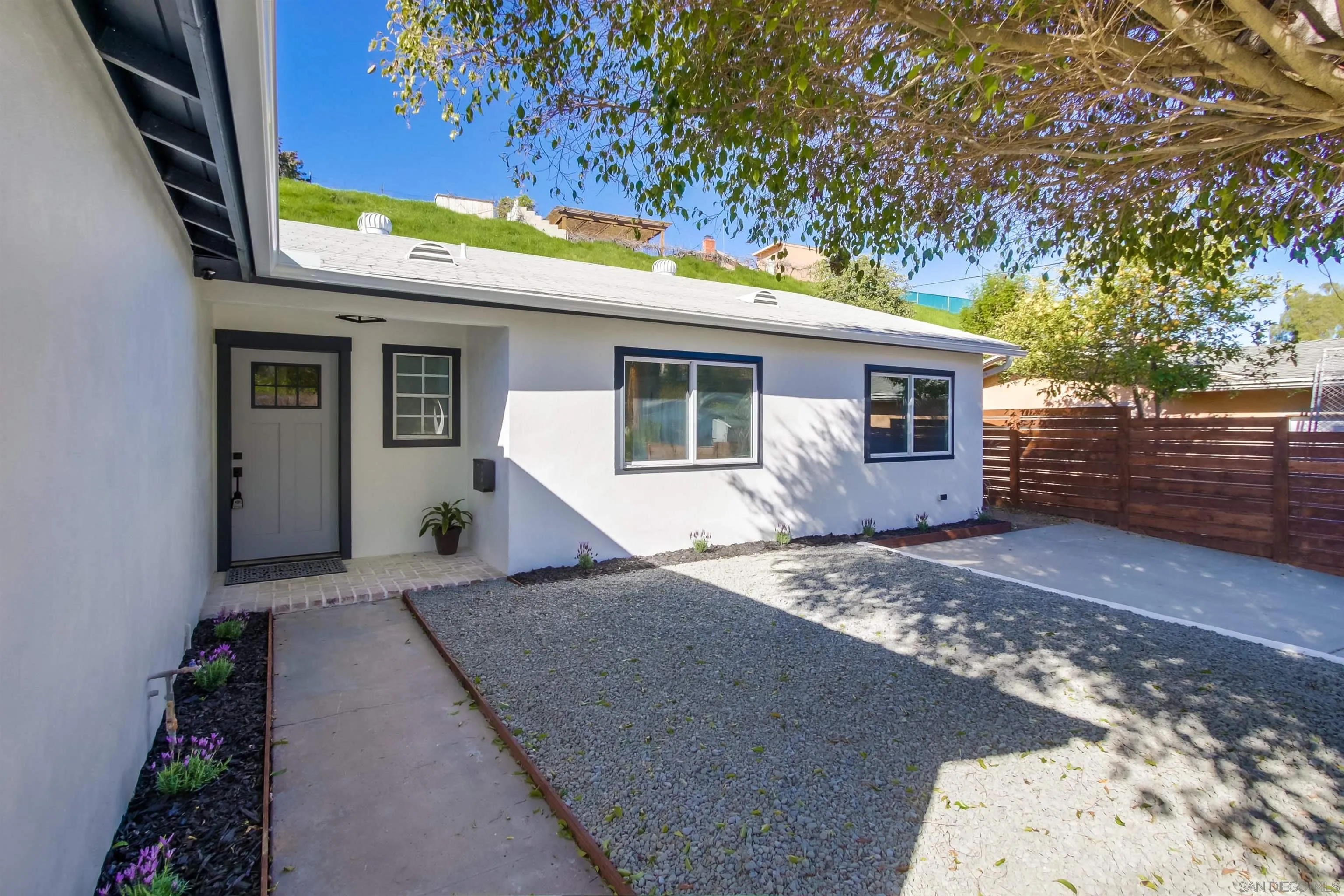 238 69th Street San Diego, CA 92114 - Photo 6 of 27 a view of a house with a patio
