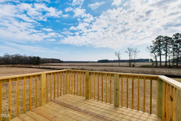 a view of wooden floor with a lake view