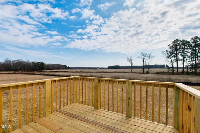 a view of wooden floor with a lake view