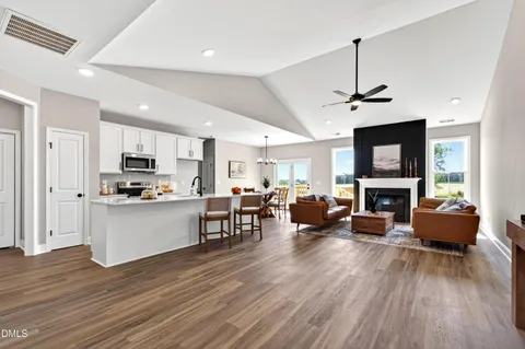 a kitchen with a sink a counter top space and appliances