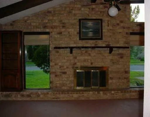 a front view of a house with yard